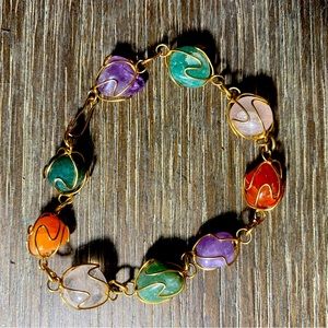 Beaded bracelet with gold accents and clip